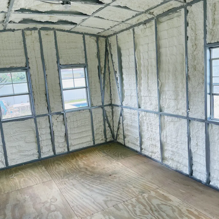 Closed-cell spray foam insulation applied to wall cavities in a residential project in Niskayuna